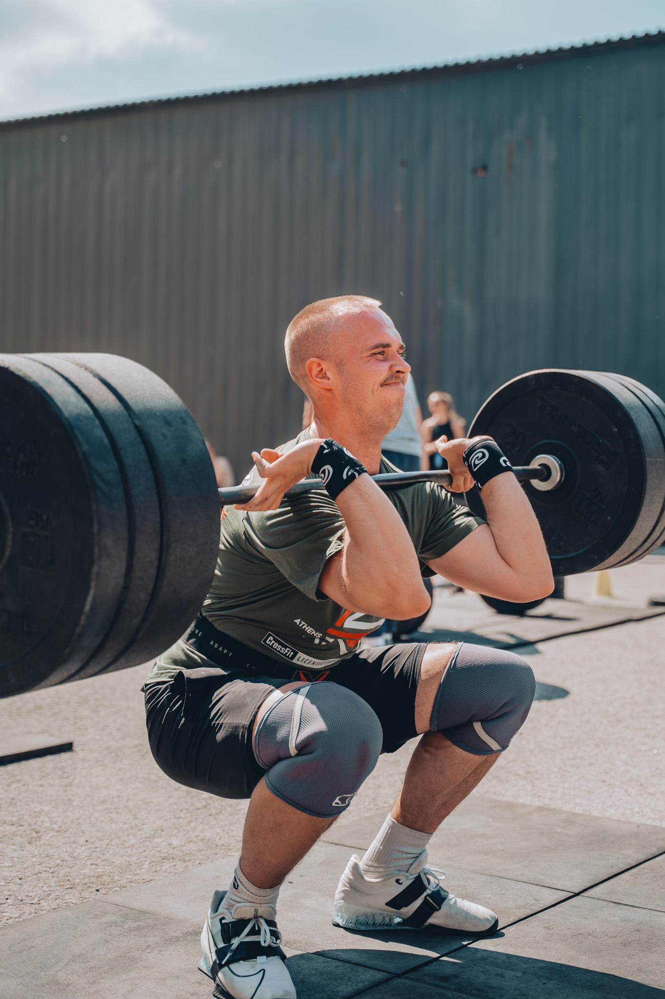 Athlete front squat under heavy load